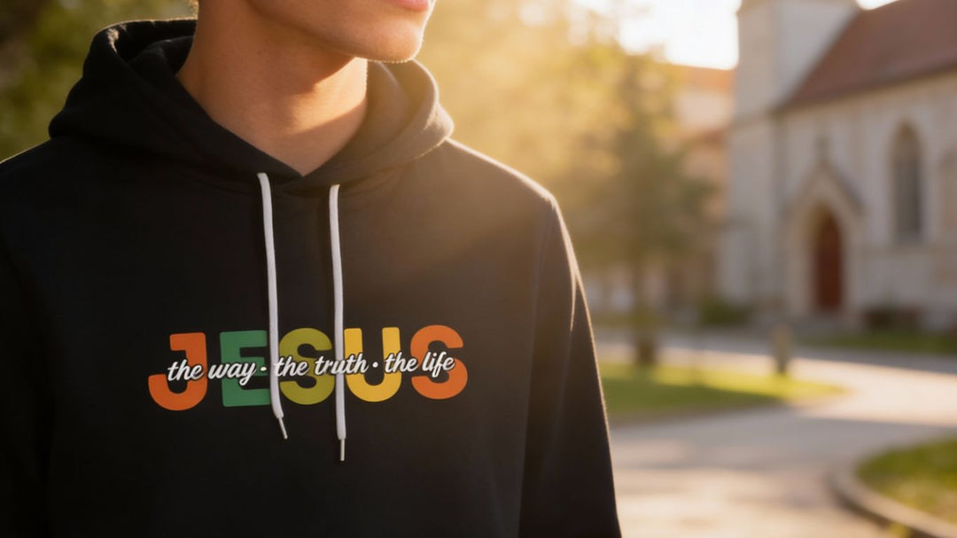 A person wears a black hoodie with "JESUS the way - the truth - the life" text.